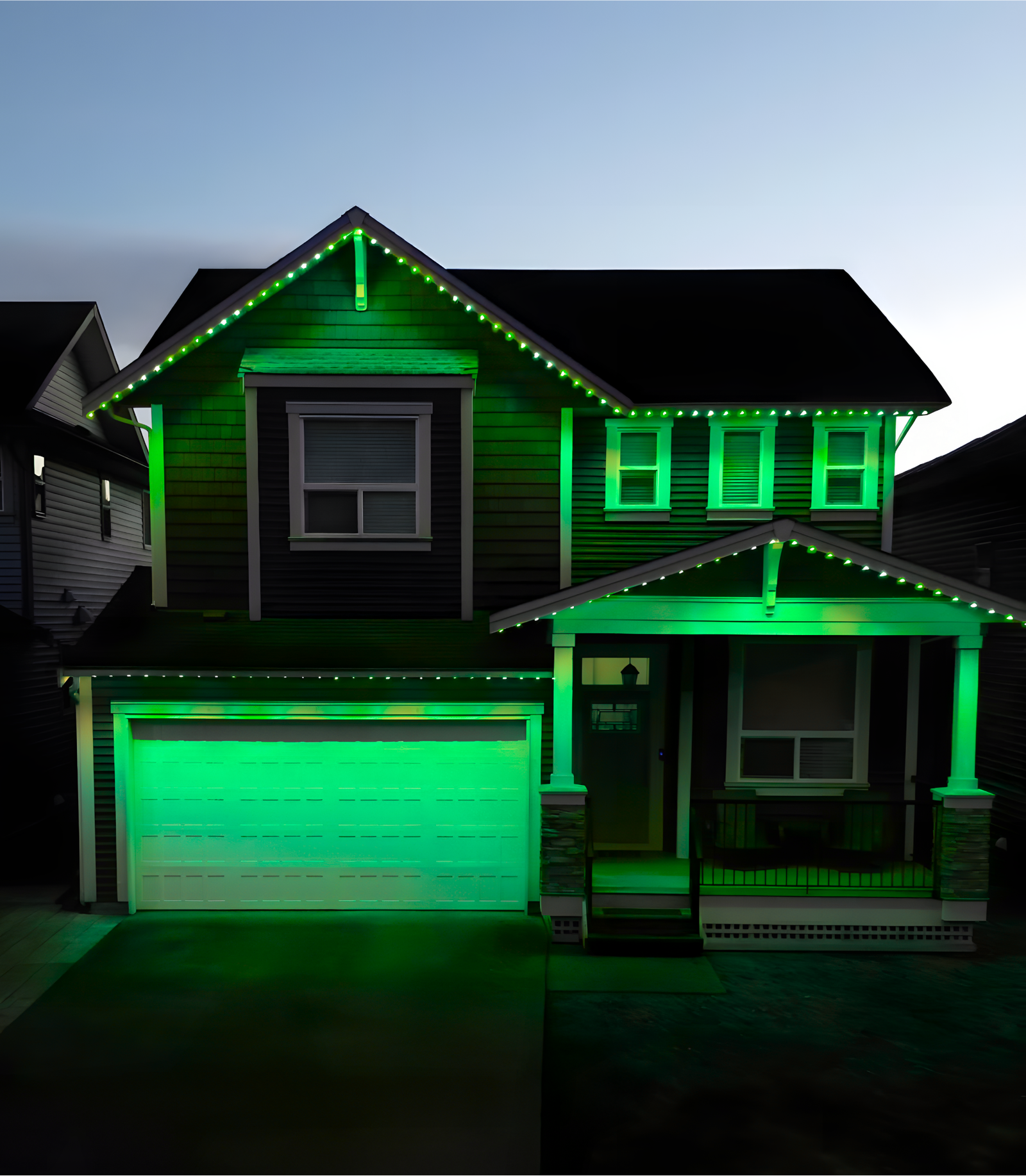 Edmonton home illuminated with green permanent lighting